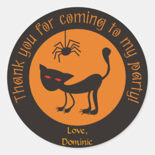 Zwarte kat met roodkleurige haverklikkers ronde sticker