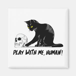 Zwarte kat met schedel spelen met me menselijke kr magneet