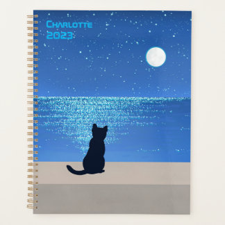Zwarte kat onder volle maan sterrennacht planner