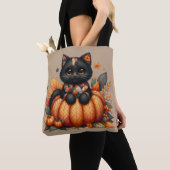 Zwarte kat op pompoen met herfst quilt patroon tote bag