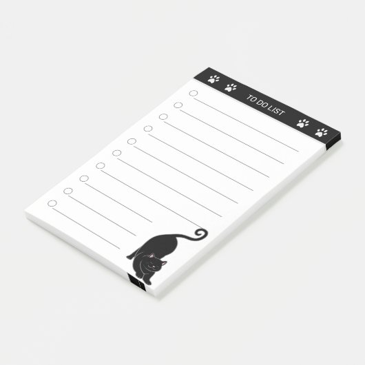 Zwarte kat op zwart-witte briefjes post-it® notes (Schuin)