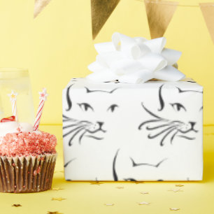 zwarte kat schetst wit cadeaupapier