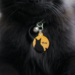 Zwarte kat silhouet op een feestelijke oranje glit huisdierpenning