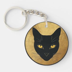 Zwarte kat silhouet tegen een gouden cirkel sleutelhanger
