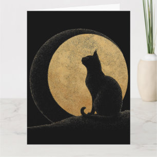 Zwarte kat silhouet tegen een gouden maan kaart