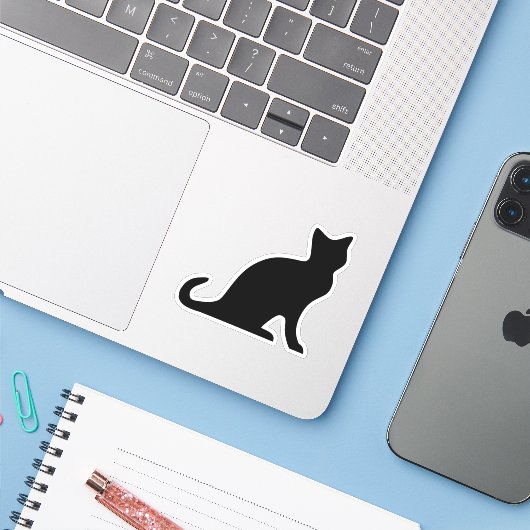 Zwarte kat silhouet vinyl sticker (Laptop met iPhone)