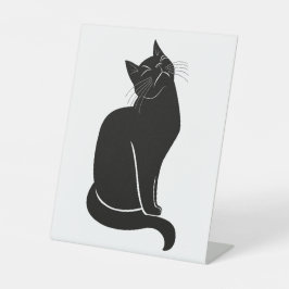 Zwarte kat tekening reclamebord met voetstuk
