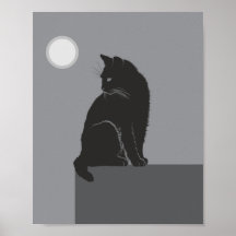 zwarte kat zit op tafel
