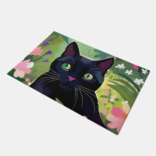 Zwarte kat zittend in een veld van bloemen deurmat (Schuin)
