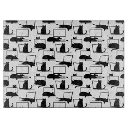 Zwarte katten die op het laptoppatroon zitten snijplank