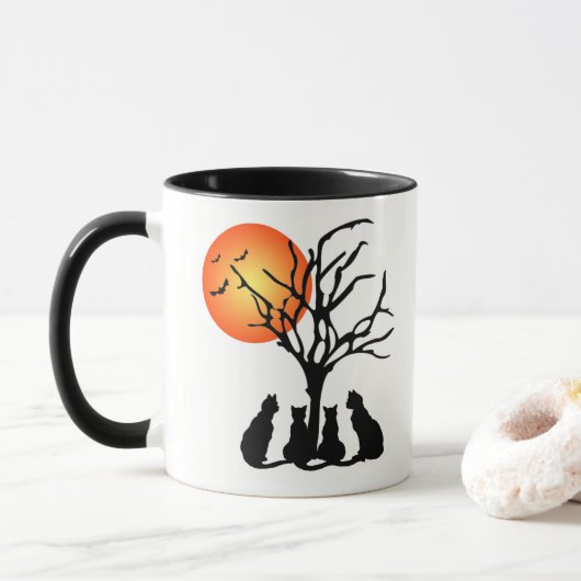 Zwarte katten in het maanlicht mok (Met donut)