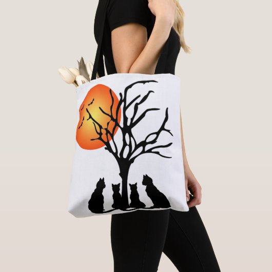 Zwarte katten in het motorlicht tote bag (Dichtbij)
