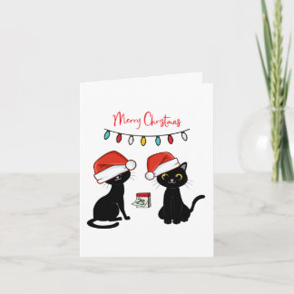 Zwarte katten in kerstmannenhoeden Prettig kerstfe Kaart