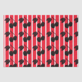 Zwarte kersen op rood en wit gestreept tissuepapier