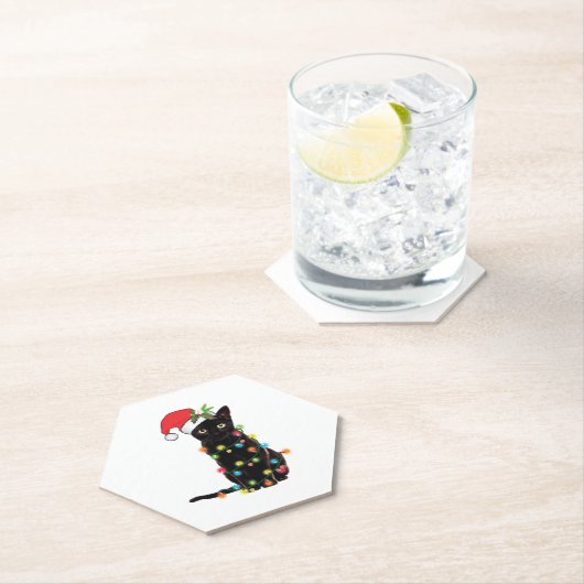 Zwarte kerstkat met lichte kerstmis kartonnen onderzetters (Insitu)