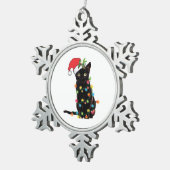 Zwarte kerstkat met lichte kerstmis tin sneeuwvlok ornament (Rechts)