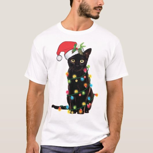 Zwarte kerstkat omhoog gedraaid in lichte kerstSan T-shirt (Voorkant)