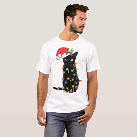 Zwarte kerstkat omhoog gedraaid in lichte kerstSan T-shirt (Voorkant volledig)
