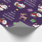 Zwarte Kerstman en vrienden Cadeaupapier (Hoek)