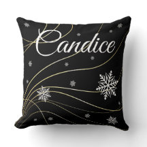 Zwarte kerststijl kussens.