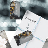 zwarte kerstversiering met lint cadeaulabel