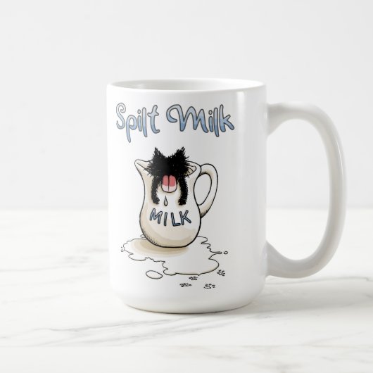 Zwarte kitten en gemorste melk koffiemok (Rechts)