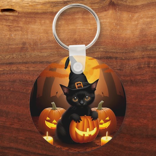Zwarte kitten in heks Pet te midden van Halloween  Sleutelhanger (Achterkant)