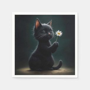 Zwarte kitten met een witte daisy servet