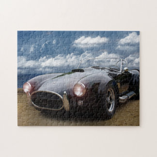 Zwarte kobra op de strand, klassieke auto legpuzzel
