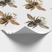 Zwarte koningin bijen op wit cadeaupapier (Hoek)