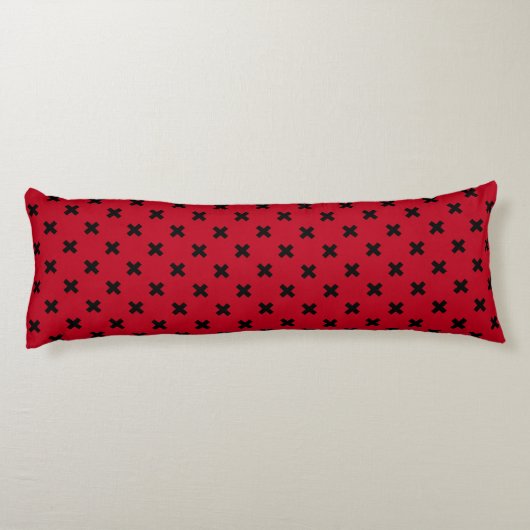 Zwarte kruisstift op rood lichaamskussen (Achterkant)