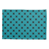 Zwarte kruisstiften op blauwgroen kussensloop (Achterkant)