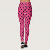 Zwarte kruisstiften op fuchsia leggings (Achterkant)