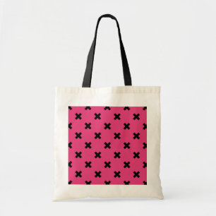 Zwarte kruisstiften op fuchsia tote bag