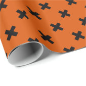 Zwarte kruisstiften op sinaasappel cadeaupapier (Rol Hoek)