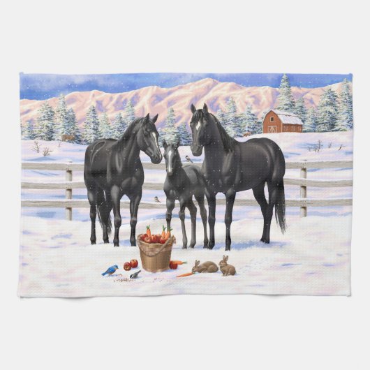 zwarte kwartpaarden in sneeuw theedoek (Horizontaal)
