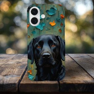 Zwarte labrador in bladeren iPhone 16 hoesje