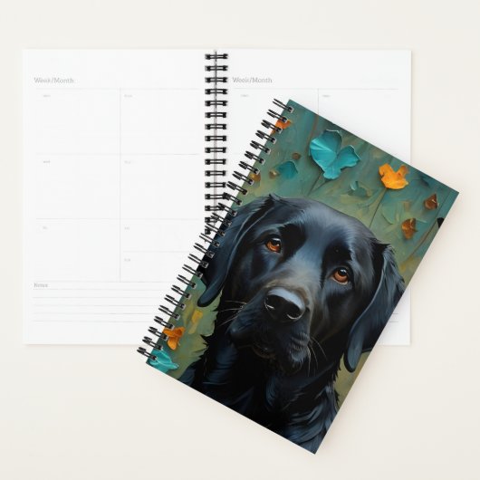 Zwarte labrador in bladeren planner (Display)