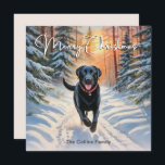 Zwarte labrador in de winter Vrolijk kerstfeest Feestdagenkaart<br><div class="desc">Deze stijlvolle kerstkaart is een afbeelding van een zwarte labrador die geniet van een wandeling door een besneeuwd landschap, met rode bessen en groenblijvende bomen op een heldere dag. Bovenaan staat de begroeting 'Merry Christmas' in stijlvolle scripttypografie, terwijl de tekst onderaan kan worden gepersonaliseerd met jouw namen of andere woorden....</div>