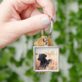 Zwarte labrador in droog gras sleutelhanger (Hand)