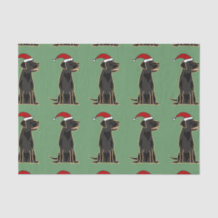 Zwarte labrador in kerstcadeaupapier voor kerstcad tissuepapier