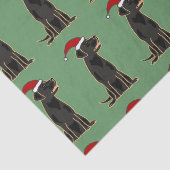 Zwarte labrador in kerstcadeaupapier voor kerstcad tissuepapier (Detail)
