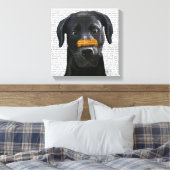 Zwarte labrador met bot op neus canvas afdruk (Insitu (Slaapkamer))