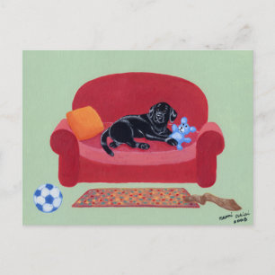 Zwarte labrador op de roze bank briefkaart