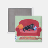 Zwarte labrador op de roze bank magneet (Voorkant / Achterkant)