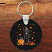 Zwarte Labradorhond en pompoensnoep grappig Sleutelhanger (Voorkant)