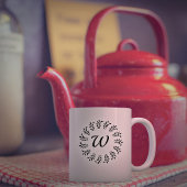 Zwarte lauwerkrans met monogram koffiemok