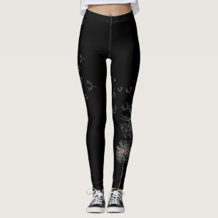 Zwarte Leggings met Paardenbloem Print op één been