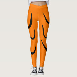 Zwarte lijnen strepen en oranje kleur leggings