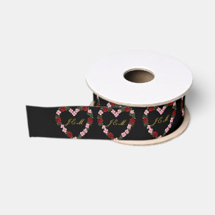 zwarte lint met een roze en rode hart